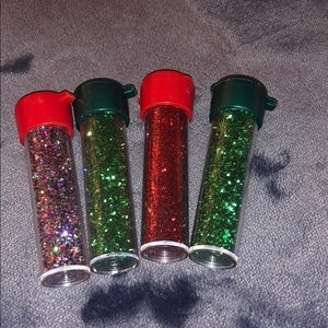 Four glitter tubes